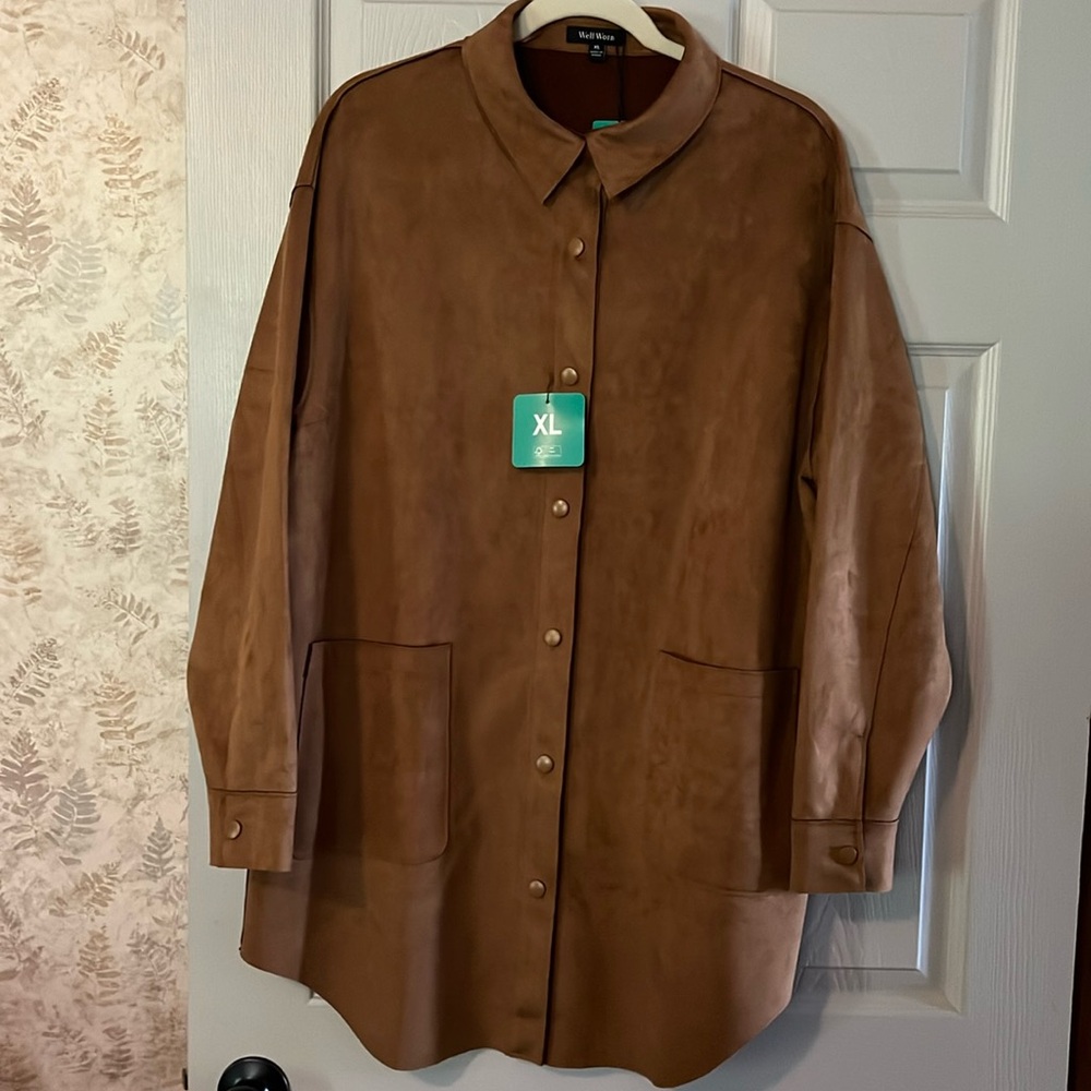 Brand new w/ tags . Brown suede like material. Very soft snap front.